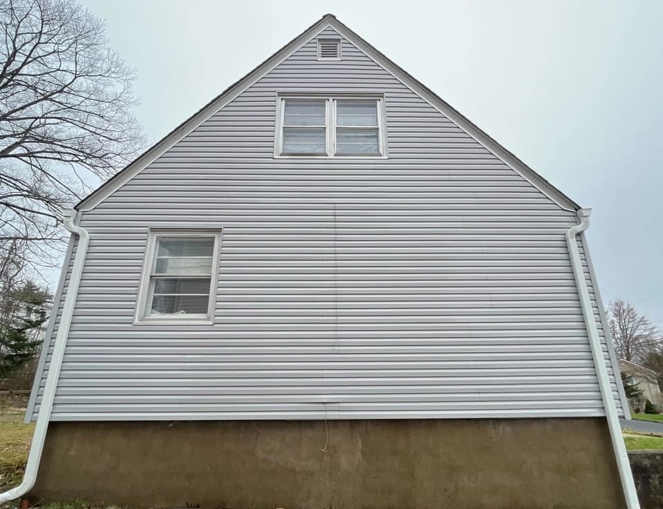 Eastlake Power Washing technician performing detailed house washing in Eastlake residential area